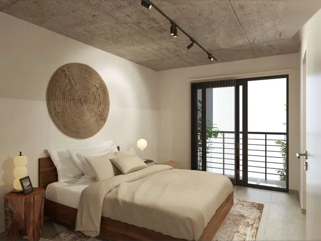 Dormitorio con balcón del departamento C